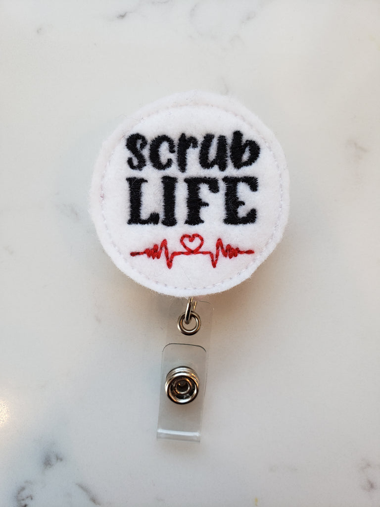 White scrub life badge reel with heart beat
