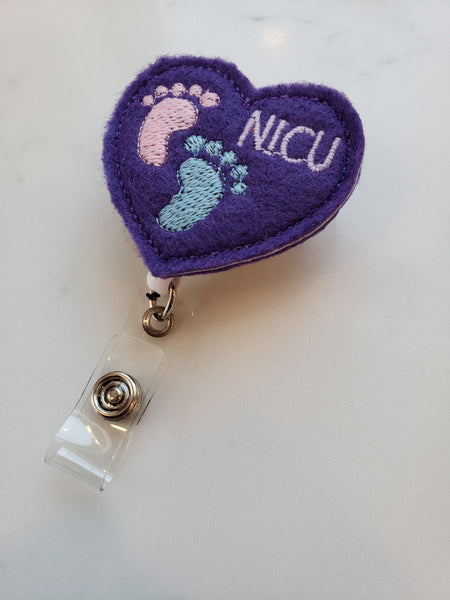 Purple heart badge reel with embroidered NICU baby feet