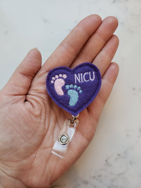 Purple heart badge reel with embroidered NICU baby feet